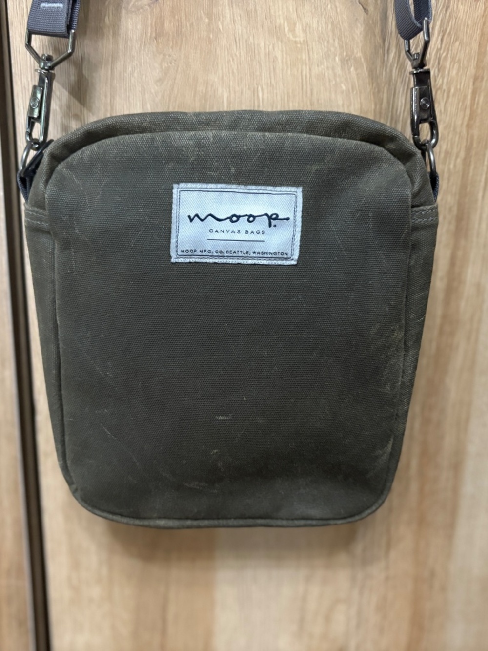 Moop adjustable crossbody waxed canvas green bag made in Seattle, Washington
